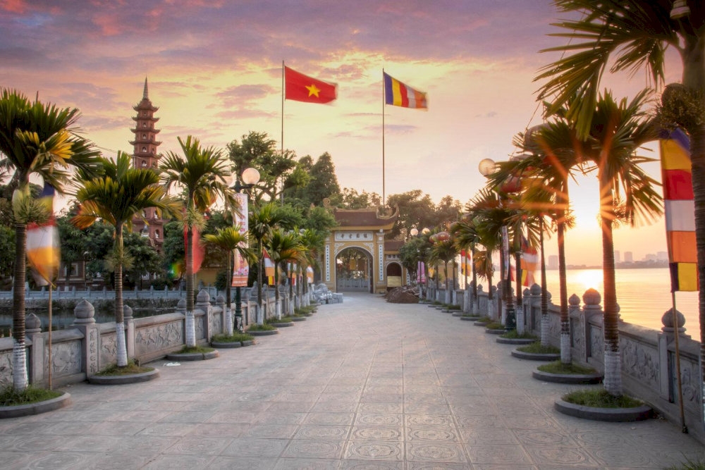 Tran Quoc Pagoda's gate glows at sunset
